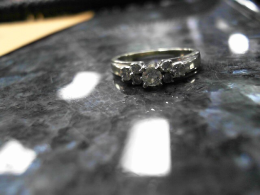 Lady's Diamond Solitaire Ring 7 Diamonds .21 Carat T.W. 14K White Gold 3.64g