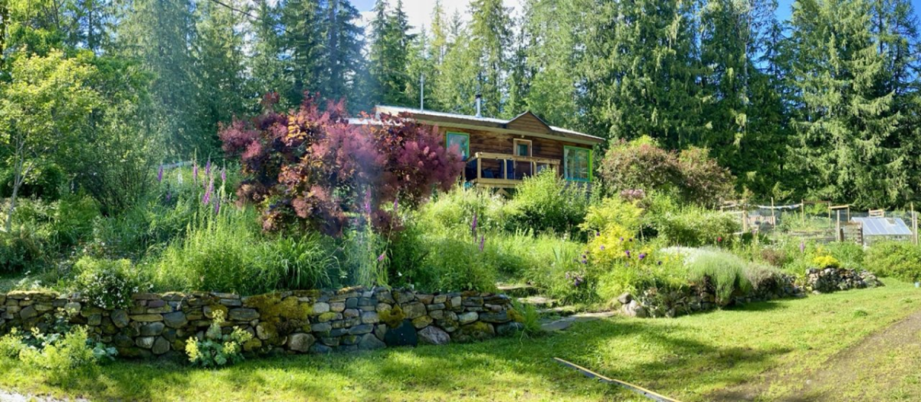 Creekside homestead on 1.23 acres in the beloved artisan community of Crawford Bay