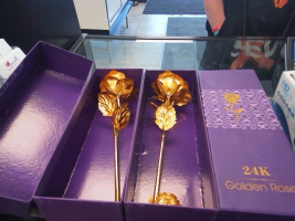 TWO 24K ROSES-ONE BROKEN LEAF